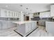 Open kitchen features a large island, modern appliances, and stylish cabinetry at 281 Powerbilt Ave, Las Vegas, NV 89148