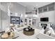 Bright living room with high ceilings, modern fireplace, and stylish decor at 281 Powerbilt Ave, Las Vegas, NV 89148
