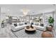 Spacious living area seamlessly connecting to the kitchen, perfect for entertaining at 281 Powerbilt Ave, Las Vegas, NV 89148