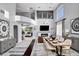 Open floor plan showcasing the living and dining areas with elegant furnishings at 281 Powerbilt Ave, Las Vegas, NV 89148