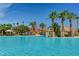 Expansive swimming pool with clear blue water and playful water features, perfect for Gathering fun at 281 Powerbilt Ave, Las Vegas, NV 89148