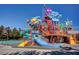 Colorful community water park featuring multiple slides, climbing structures, and water features at 281 Powerbilt Ave, Las Vegas, NV 89148