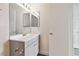 This half-bath features an updated vanity with great lighting at 3151 Soaring Gulls Dr # 2081, Las Vegas, NV 89128