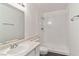 A bathroom features an updated vanity and step-in shower at 3151 Soaring Gulls Dr # 2081, Las Vegas, NV 89128
