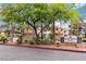 Community entrance with lush landscaping and Desert Shores Villas signage for a welcoming appeal at 3151 Soaring Gulls Dr # 2081, Las Vegas, NV 89128