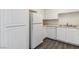This home features an all white kitchen with updated appliances and plenty of cabinet space at 3151 Soaring Gulls Dr # 2081, Las Vegas, NV 89128