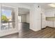This home features wood flooring and an open concept kitchen looking out on a well lit living space at 3151 Soaring Gulls Dr # 2081, Las Vegas, NV 89128