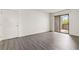 Living room features new flooring and access to balcony at 3151 Soaring Gulls Dr # 2081, Las Vegas, NV 89128
