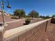 Beautiful community park featuring walking paths, mature trees, decorative lighting, and well-maintained landscaping at 32 Focal Point Ave, North Las Vegas, NV 89031