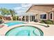 Gorgeous backyard featuring a refreshing pool, relaxing spa, and covered patio for outdoor enjoyment at 3913 Ricebird Way, North Las Vegas, NV 89084