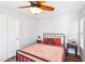 Comfortable bedroom with natural light, a ceiling fan, and a sliding door closet at 3913 Ricebird Way, North Las Vegas, NV 89084