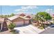 Charming single-Gathering home with a three-car garage, well-manicured landscaping, and a welcoming facade at 3913 Ricebird Way, North Las Vegas, NV 89084