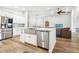 Kitchen features stainless steel appliances, white cabinets, and stainless steel sink at 3913 Ricebird Way, North Las Vegas, NV 89084