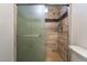 Shower stall features tile surround, glass doors, and shower wand at 3925 Torsby Pl, Las Vegas, NV 89119