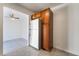 Bright kitchen area with stainless steel refrigerator, and overhead cabinets at 3925 Torsby Pl, Las Vegas, NV 89119