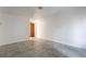 Open concept living room space with tiled floors and light colored walls at 3925 Torsby Pl, Las Vegas, NV 89119
