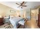 Spacious bedroom featuring a ceiling fan, neutral walls and ensuite bath at 3966 E Garfield Dr, Pahrump, NV 89061