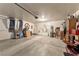 Spacious garage with overhead storage and ample room for parking and projects at 3966 E Garfield Dr, Pahrump, NV 89061