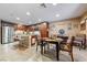 Eat-in kitchen with a large island, stainless-steel appliances, and a dining area at 3966 E Garfield Dr, Pahrump, NV 89061