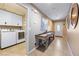 Functional laundry room area featuring modern machines and convenient storage at 3966 E Garfield Dr, Pahrump, NV 89061