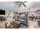 Bright, open-concept living space with a kitchen, dining area, and comfortable seating area at 3966 E Garfield Dr, Pahrump, NV 89061
