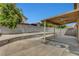 Spacious backyard with a large concrete patio, perfect for outdoor activities and entertainment at 4008 Lighthouse Ave, Las Vegas, NV 89110