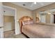 Bedroom features two doors, closet with sliding doors, and a bed at 4008 Lighthouse Ave, Las Vegas, NV 89110