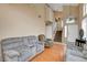 Bright living room with high ceilings, hardwood floors, and ample natural light at 4008 Lighthouse Ave, Las Vegas, NV 89110