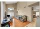 Bright living room with high ceilings, hardwood floors, and ample natural light at 4008 Lighthouse Ave, Las Vegas, NV 89110