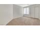 Bedroom with carpet flooring, closet with sliding doors, and window with blinds at 4331 Golden Palomino Ln, North Las Vegas, NV 89032