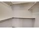 Empty closet with multiple shelves and bars at 4331 Golden Palomino Ln, North Las Vegas, NV 89032