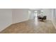 Open dining room with sleek floors, modern light fixture, and easy access to other living spaces at 4331 Golden Palomino Ln, North Las Vegas, NV 89032