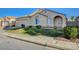 Inviting single-story home boasting desert landscaping, and a covered front entry at 4331 Golden Palomino Ln, North Las Vegas, NV 89032