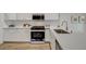 Well-equipped kitchen featuring stainless steel appliances and quartz countertops at 4331 Golden Palomino Ln, North Las Vegas, NV 89032