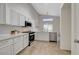 Beautiful kitchen with white cabinetry and stainless steel appliances at 4331 Golden Palomino Ln, North Las Vegas, NV 89032