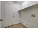 Laundry area with wood-look floors, a door to the outside, and washer hookups at 4331 Golden Palomino Ln, North Las Vegas, NV 89032