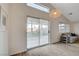 Bright living room with sliding glass doors leading to the backyard at 4331 Golden Palomino Ln, North Las Vegas, NV 89032