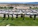 New home community showcasing modern homes, green spaces, and mountain views in a Primary-planned area at 4356 E Cactus Canyon Dr, Pahrump, NV 89061