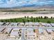 View of new development featuring modern homes, landscaping and a golf course under construction at 4356 E Cactus Canyon Dr, Pahrump, NV 89061