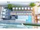 Stunning rooftop pool area featuring private cabanas, lounge chairs, and tables with great overhead view at 4381 W Flamingo Rd # 18320, Las Vegas, NV 89103
