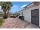 Inviting backyard patio features a grill and seating, perfect for outdoor entertaining at 4602 Inland Ct, Las Vegas, NV 89147