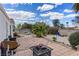 Spacious backyard features a patio area, mature landscaping, and room for activities at 4602 Inland Ct, Las Vegas, NV 89147