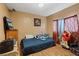 Cozy bedroom with wood look floors, natural light, and closet space at 4602 Inland Ct, Las Vegas, NV 89147