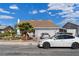 Charming single-story home with a two-car garage and low maintenance desert landscaping in the front yard at 4602 Inland Ct, Las Vegas, NV 89147