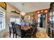Elegant dining room with a chandelier and ornate furnishings at 4735 Roby Grey Way, North Las Vegas, NV 89081