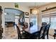 Open dining area with seamless flow to the living room, perfect for entertaining at 4735 Roby Grey Way, North Las Vegas, NV 89081