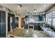 Updated kitchen featuring stainless steel appliances, granite countertops, and ample cabinet space at 4735 Roby Grey Way, North Las Vegas, NV 89081