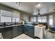 Bright kitchen with generous counter space and large windows at 4735 Roby Grey Way, North Las Vegas, NV 89081