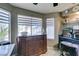 Bright kitchen with stainless steel appliances and plenty of natural light from the window at 4735 Roby Grey Way, North Las Vegas, NV 89081
