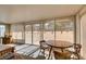 Relaxing sun room featuring natural light and views of the backyard at 4735 Roby Grey Way, North Las Vegas, NV 89081